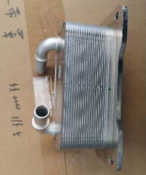 Радиатор масляный охладитель 1066029000 Geely Tugella